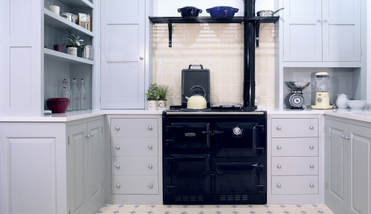 New Classic A style we have recently introduced. There are no rails between the drawer fronts, and the cupboard fronts are an integral part of the frame and extend all the way to the floor.